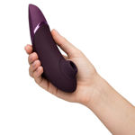 Womanizer Next ( Couleur Mauve Foncé seulement disponible)